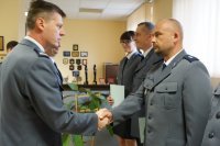 Komendant Miejski Policji w Zabrzu insp. Dariusz Wesołowski z asp.sztab. Tamarą Cieślak - Kraj, podko. Zbigniewem Wielgoszem i podkom. Jarosławem Łępickim.