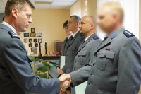 Komendant Miejski Policji w Zabrzu insp. Dariusz Wesołowski z asp.sztab. Tamarą Cieślak - Kraj, podko. Zbigniewem Wielgoszem i podkom. Jarosławem Łępickim.