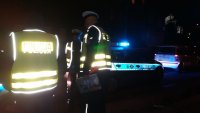 Policjanci zabrzańskiej drogówki zabezpieczający miejsce wypadku drogowego