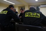 Policjanci podczas odprawy służbowej
