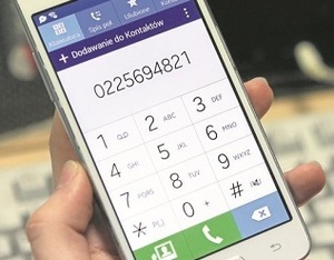 Telefon komórkowy trzymany w ręce