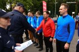 Zdjęcie kolorowe: Zabrzańscy policjancie podczas Igrzysk Policyjnych z okazji 100. rocznicy powołania Policji Państwowej.